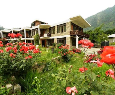 https://imgcld.yatra.com/ytimages/image/upload/t_hotel_yatra_city_desktop/v1437830417/Domestic Hotels/Hotels_Manali/Tourist Hotel/Over_view_2.jpg